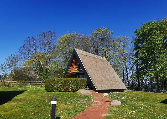 Casa de Férias Reetdach Ferienhaeuser Alt Reddevitz