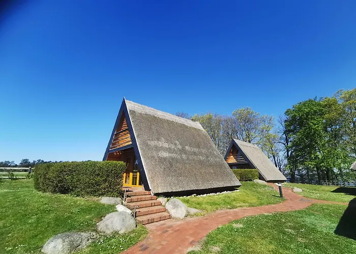 Reetdach Ferienhaeuser Casa de Férias *