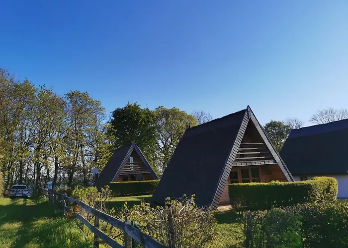 Reetdach Ferienhaeuser Casa de Férias *