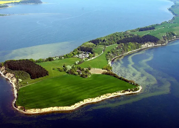 Reetdach Ferienhaeuser Casa de Férias *