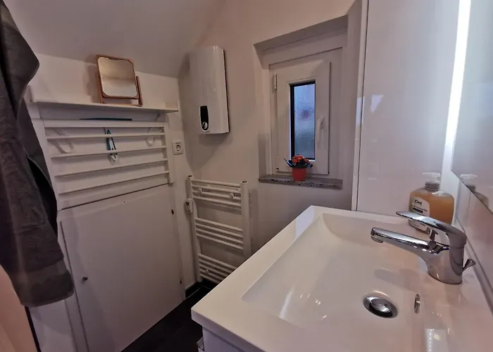 Reetdach Ferienhaeuser Casa de Férias *