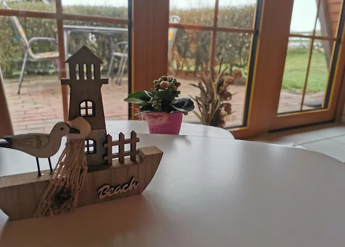 Reetdach Ferienhaeuser * Alt Reddevitz