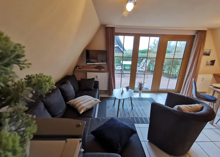 Reetdach Ferienhaeuser Casa de Férias