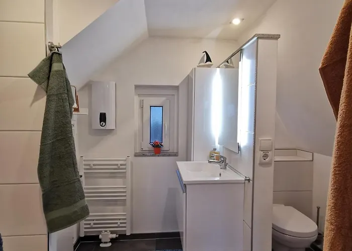 Reetdach Ferienhaeuser Casa de Férias *