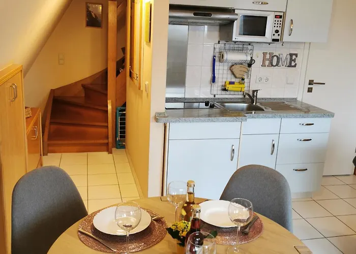 Reetdach Ferienhaeuser Casa de Férias *