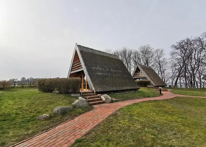 Reetdach Ferienhaeuser Casa de Férias *