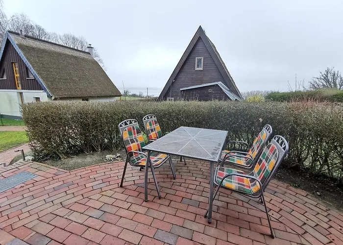 Reetdach Ferienhaeuser Casa de Férias