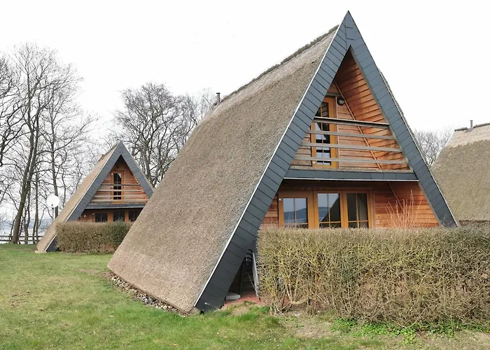 Reetdach Ferienhaeuser Casa de Férias *